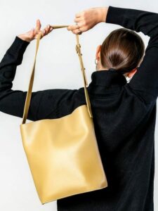 woman-from-behind-with-a-brown-crossbody-bag-mocku-2021-09-02-06-04-44-utc